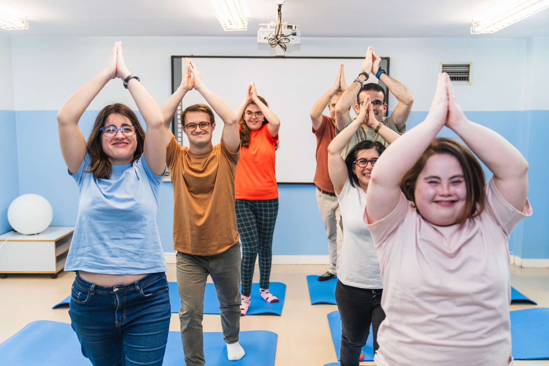 Inclusive Yoga Class With Individuals With Down Syndrome United in Pose